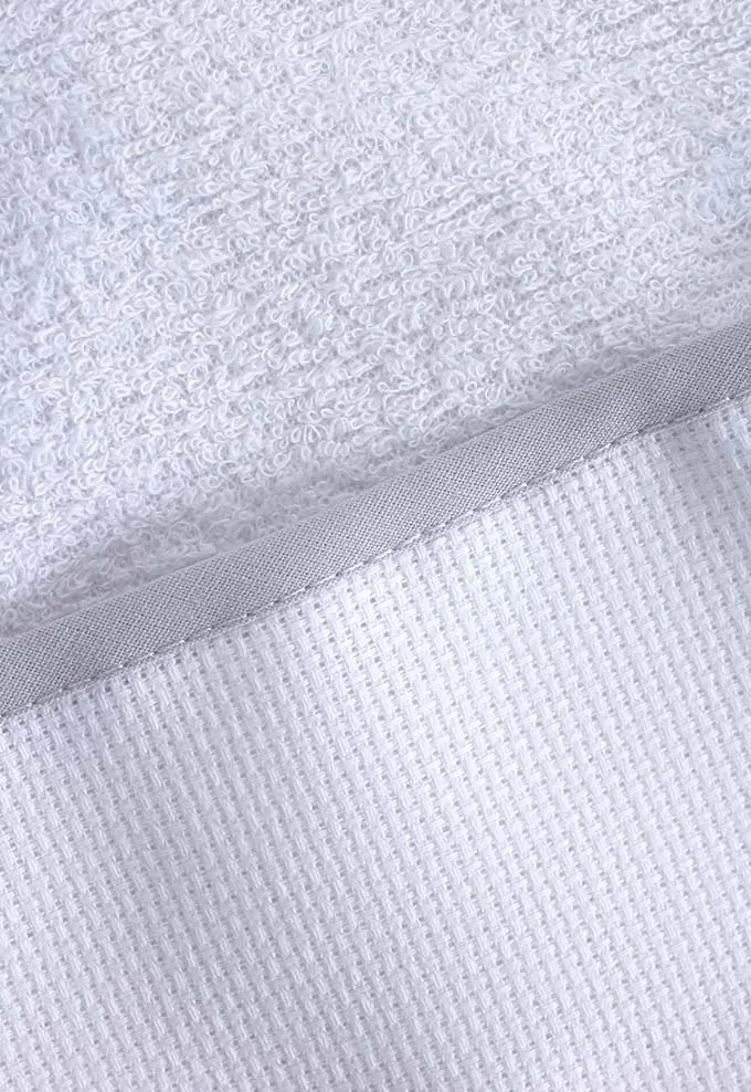 Bavoirs plastifiés à broder